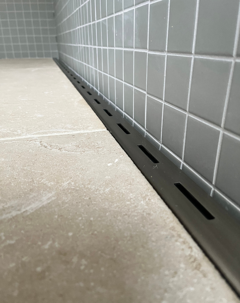 Burshed Brass showr grate in bathroom